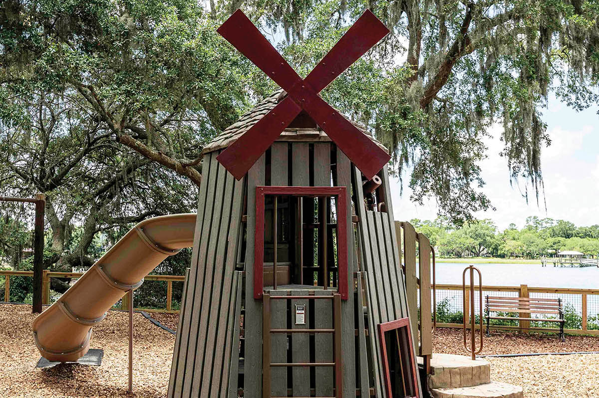 The windmill mimics the 1930s landmark across the street.